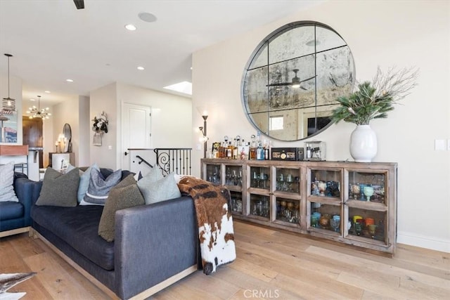2865 Rock Wren Ln, Avila Beach, CA 93424 - living room with hardwood / wood-style floors, a chandelier, recessed lighting, and baseboards