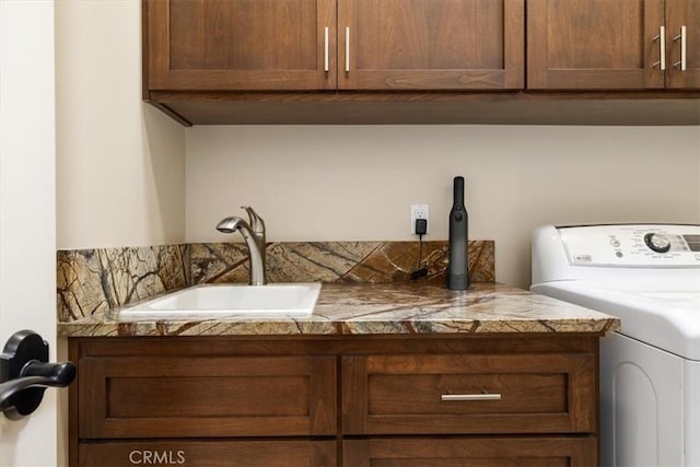 2865 Rock Wren Ln, Avila Beach, CA 93424 - clothes washing area featuring washer / clothes dryer and cabinet space