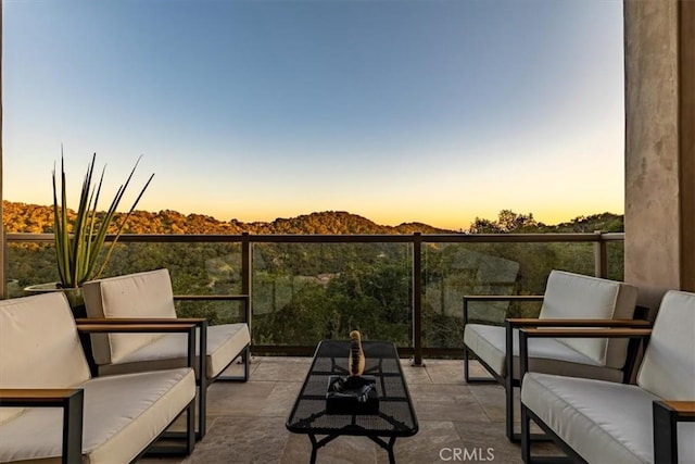 2865 Rock Wren Ln, Avila Beach, CA 93424 - patio terrace at dusk with an outdoor living space, a patio, and a mountain view