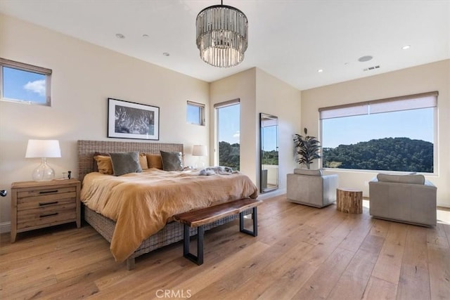 2865 Rock Wren Ln, Avila Beach, CA 93424 - bedroom featuring light wood-style floors, a chandelier, recessed lighting, and baseboards