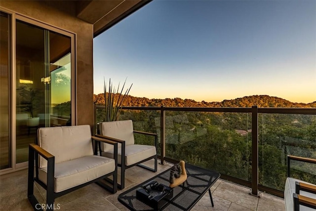 2865 Rock Wren Ln, Avila Beach, CA 93424 - patio terrace at dusk featuring a balcony and a mountain view
