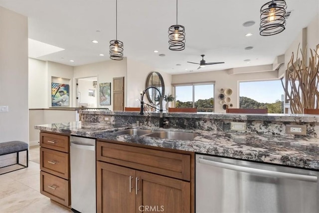 2865 Rock Wren Ln, Avila Beach, CA 93424 - kitchen featuring dishwasher, a sink, brown cabinetry, hanging light fixtures, and recessed lighting