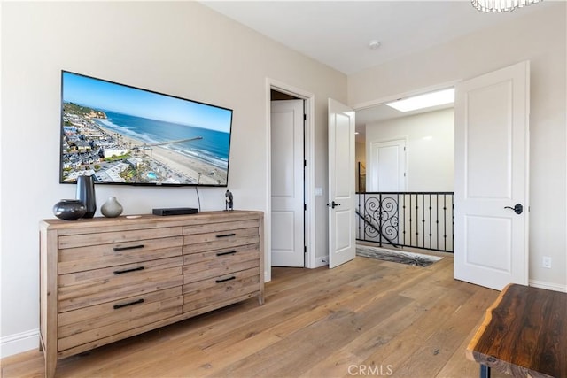 2865 Rock Wren Ln, Avila Beach, CA 93424 - hall featuring light wood-type flooring and an upstairs landing