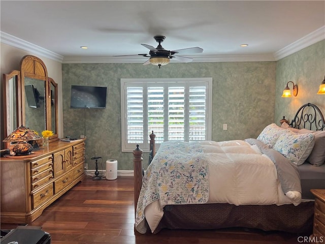 bedroom with ceiling fan, wallpapered walls, ornamental molding, and dark wood-style floors