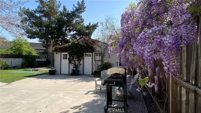 view of patio with fence