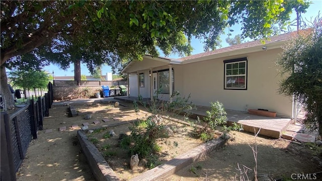 exterior space with a fenced backyard