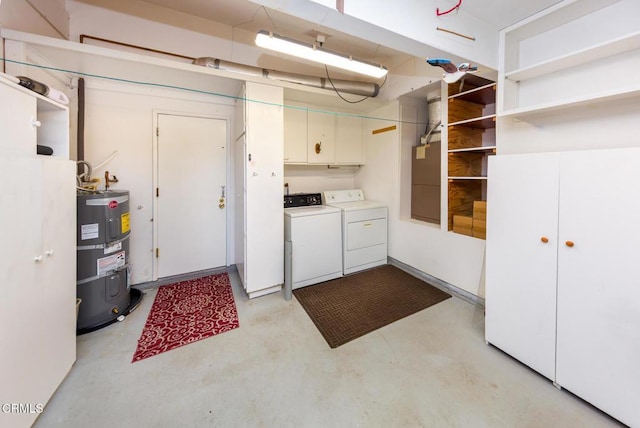 15413 Village 15, Camarillo, CA 93012 - laundry area with water heater, washing machine and dryer, and cabinet space