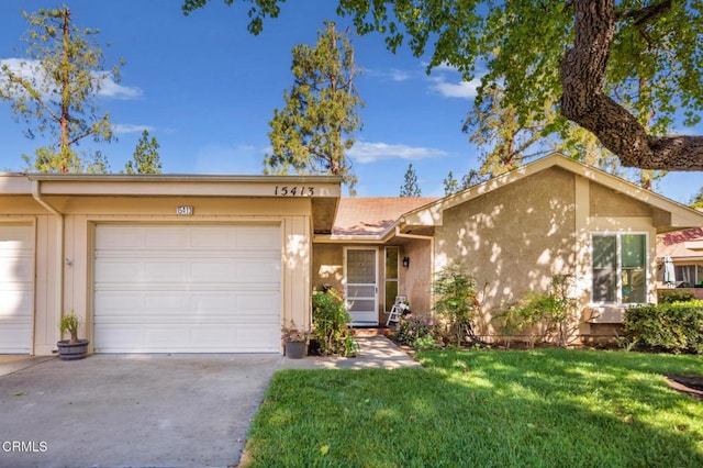 15413 Village 15, Camarillo, CA 93012 - view of front of property with a front yard, stucco siding, an attached garage, and concrete driveway