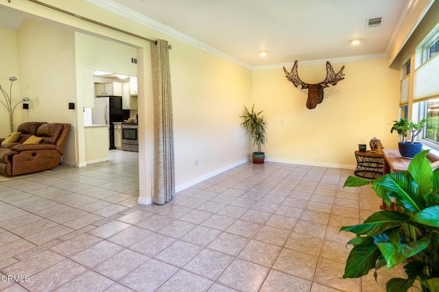 15413 Village 15, Camarillo, CA 93012 - empty room with baseboards, light tile patterned flooring, visible vents, and crown molding