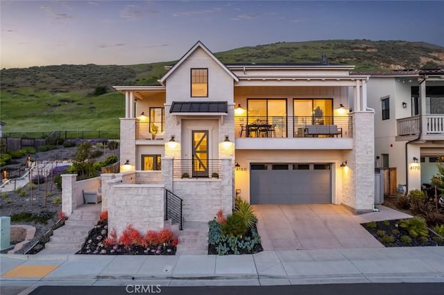 4160 Hillside Dr, San Luis Obispo, CA 93401 - view of front facade with stucco siding, stairs, an attached garage, stone siding, and driveway
