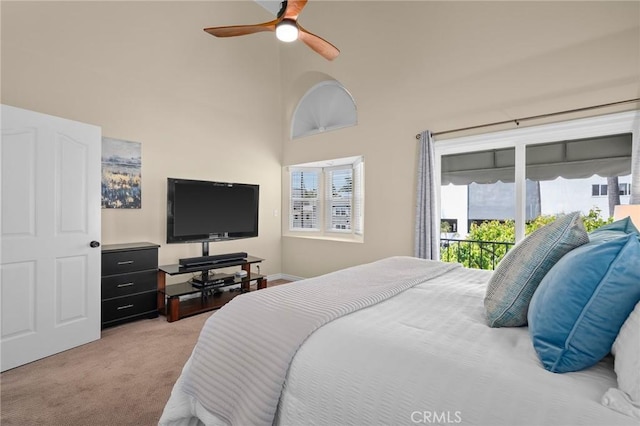 620 S Catalina Ave Unit C, Redondo Beach, CA 90277 - bedroom with light carpet, multiple windows, access to outside, a high ceiling, and a ceiling fan