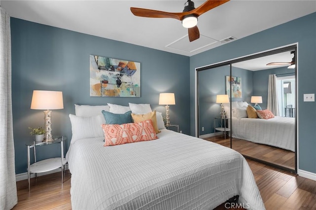 620 S Catalina Ave Unit C, Redondo Beach, CA 90277 - bedroom with wood finished floors, baseboards, a closet, and a ceiling fan
