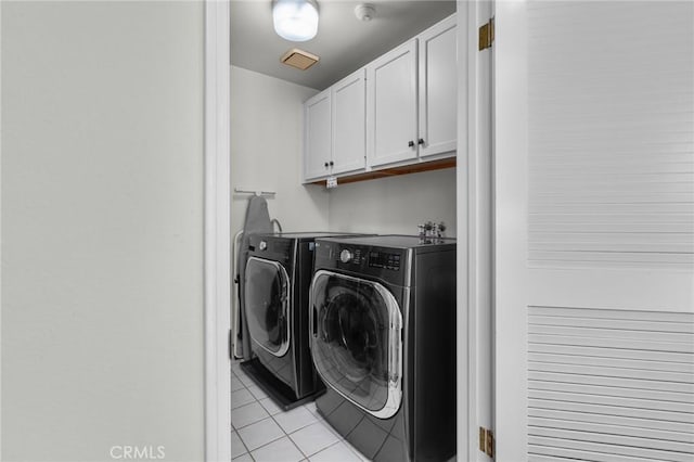 620 S Catalina Ave Unit C, Redondo Beach, CA 90277 - clothes washing area with separate washer and dryer, light tile patterned floors, and cabinet space