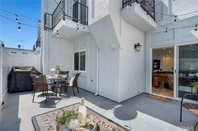 620 S Catalina Ave Unit C, Redondo Beach, CA 90277 - view of patio / terrace featuring a balcony, grilling area, fence, and outdoor dining space