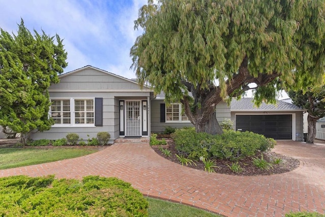 1451 Savoy Cir, San Diego, CA 92107 - ranch-style home featuring decorative driveway and an attached garage