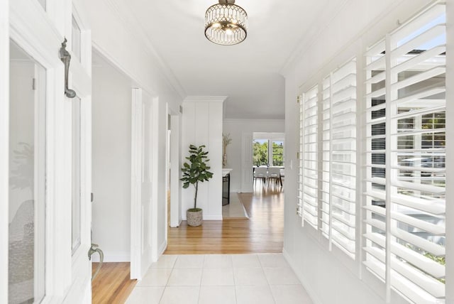 1451 Savoy Cir, San Diego, CA 92107 - hall with crown molding, a chandelier, and light wood-style flooring