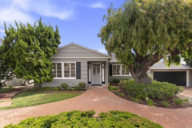 1451 Savoy Cir, San Diego, CA 92107 - ranch-style house featuring driveway and a garage