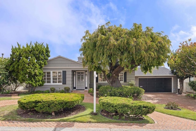 1451 Savoy Cir, San Diego, CA 92107 - view of front facade with decorative driveway and an attached garage