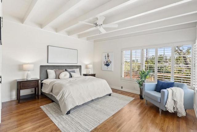 1451 Savoy Cir, San Diego, CA 92107 - bedroom with beamed ceiling, light wood finished floors, and a ceiling fan