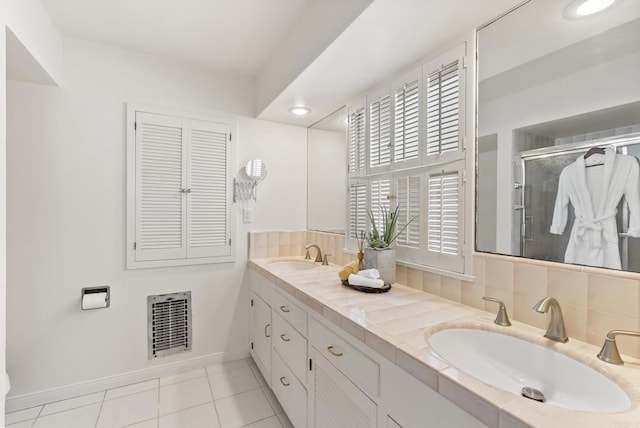 1451 Savoy Cir, San Diego, CA 92107 - bathroom featuring double vanity, a shower stall, and tile patterned floors