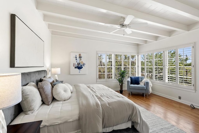 1451 Savoy Cir, San Diego, CA 92107 - bedroom featuring multiple windows, beam ceiling, wood finished floors, and a ceiling fan