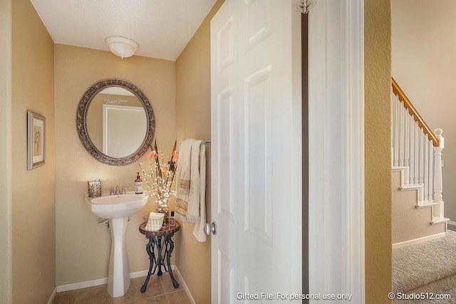 bathroom featuring baseboards