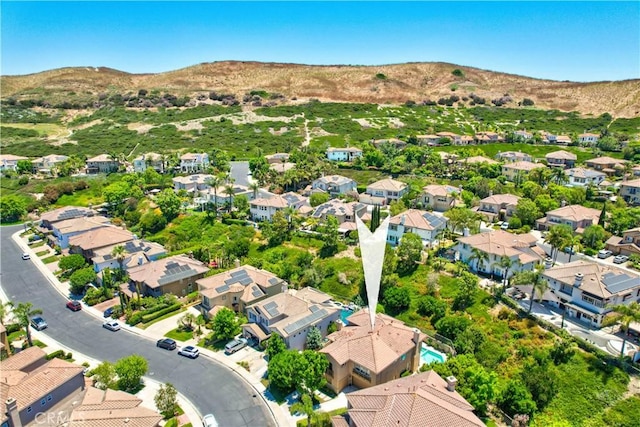aerial view with a mountain view and a residential view