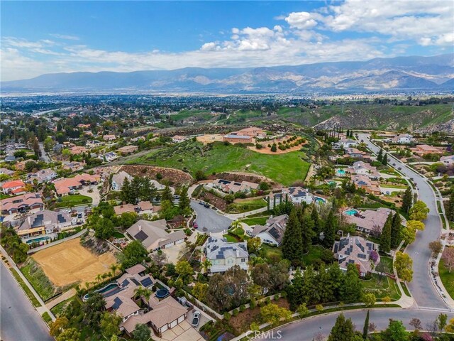 drone / aerial view with a mountain view and a residential view