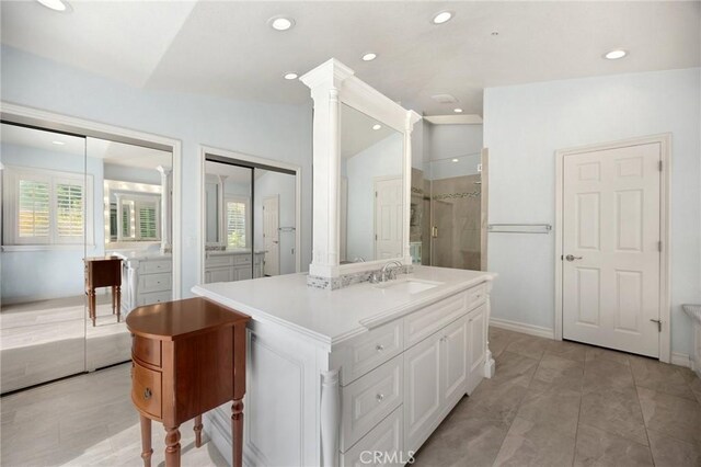 full bath featuring vanity, a shower stall, recessed lighting, and lofted ceiling