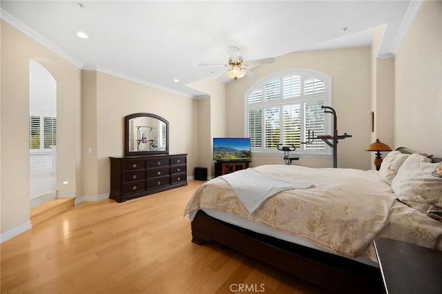 748 E Mariposa Dr, Redlands, CA 92373 - bedroom featuring ornamental molding, wood finished floors, multiple windows, arched walkways, and baseboards