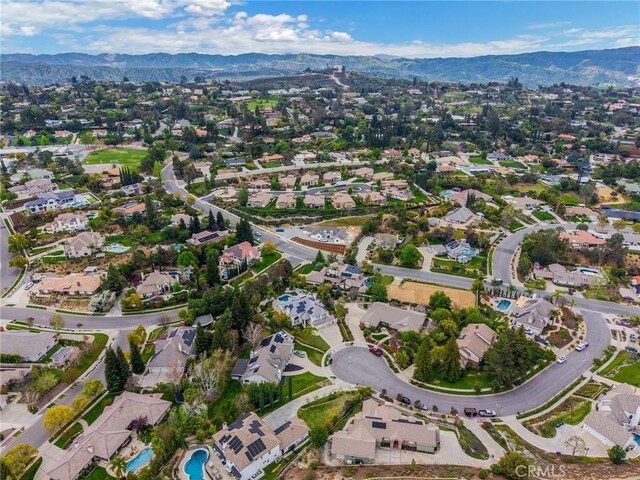 aerial view featuring a residential view and a mountain view