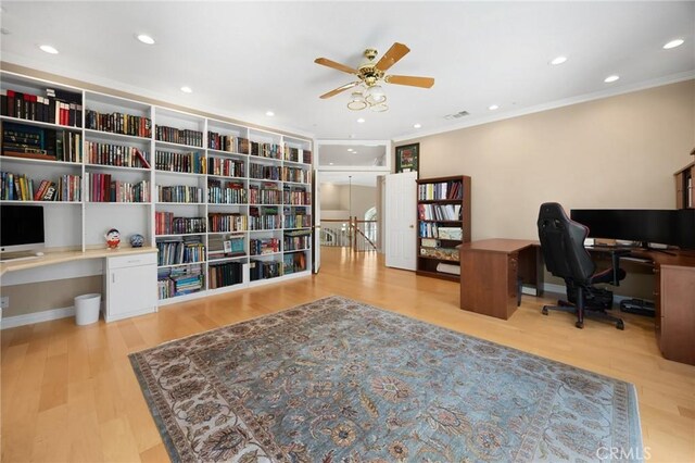 office featuring crown molding, visible vents, wood finished floors, ceiling fan, and recessed lighting