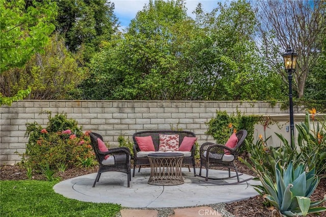 748 E Mariposa Dr, Redlands, CA 92373 - view of patio / terrace with a fenced backyard