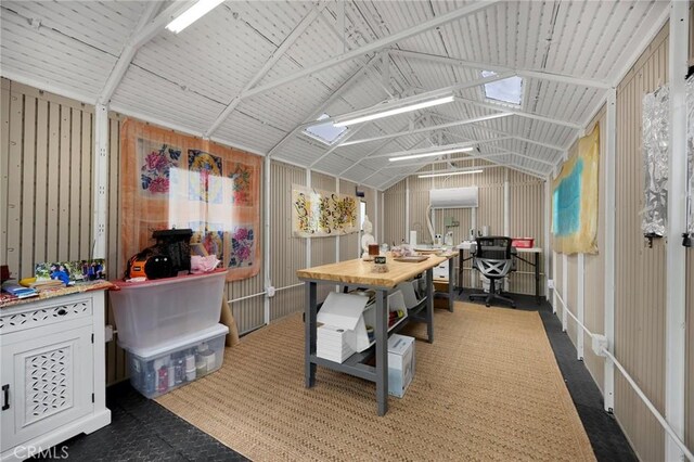 home office featuring a sunroom and lofted ceiling