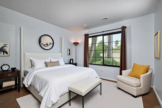 3116 Vista Bonita, Carlsbad, CA 92009 - bedroom with baseboards, wood finished floors, and visible vents
