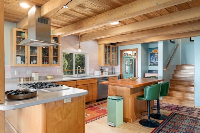 25770 E Grade Rd, Santa Ysabel, CA 92070 - kitchen featuring dishwasher, a sink, wooden ceiling with exposed beams, island exhaust hood, and butcher block counters