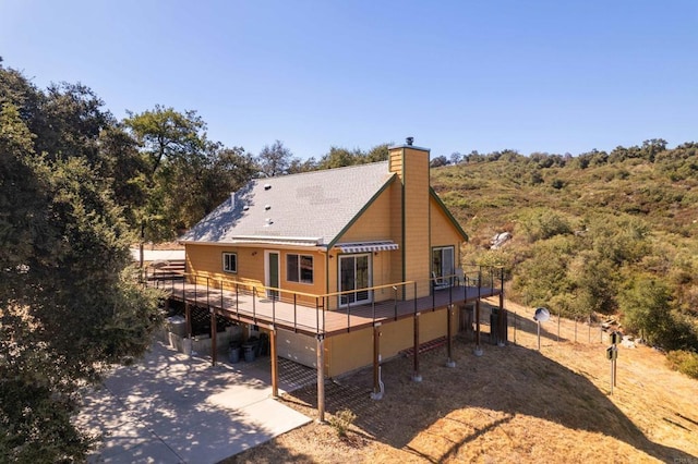 25770 E Grade Rd, Santa Ysabel, CA 92070 - back of property featuring a chimney and a wooden deck