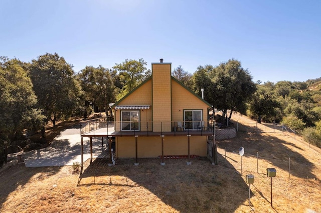 25770 E Grade Rd, Santa Ysabel, CA 92070 - rear view of house with a chimney and a deck