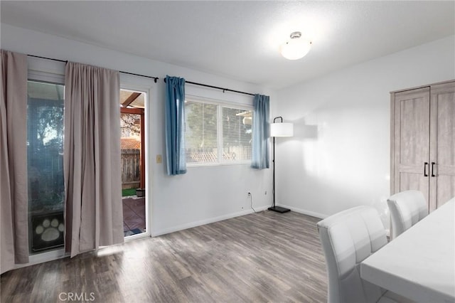 1497 Chaparral Way, Oceanside, CA 92057 - bedroom with access to exterior, wood finished floors, and baseboards