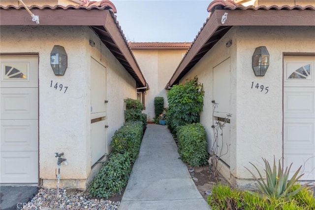 1497 Chaparral Way, Oceanside, CA 92057 - view of exterior entry featuring stucco siding and a tile roof