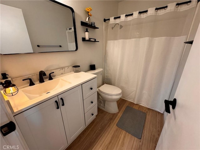1497 Chaparral Way, Oceanside, CA 92057 - full bath with wood finished floors, vanity, toilet, and curtained shower