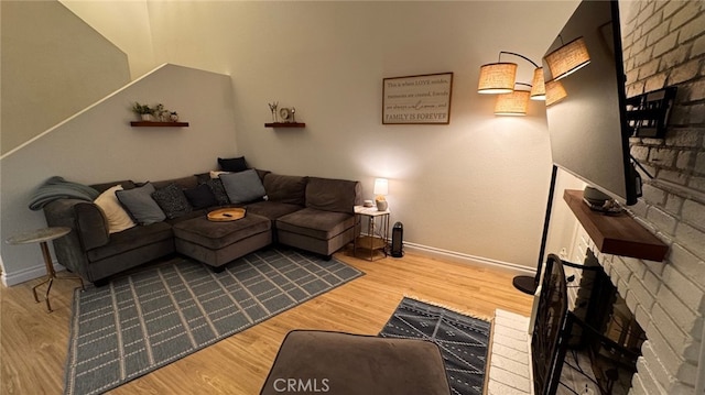 1497 Chaparral Way, Oceanside, CA 92057 - living room with a fireplace, baseboards, and wood finished floors