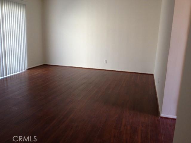 19057 Gledhill St, Northridge, CA 91324 - spare room featuring dark wood-style flooring