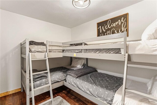 675 Grass Valley Rd, Lake Arrowhead, CA 92352 - bedroom featuring wood finished floors