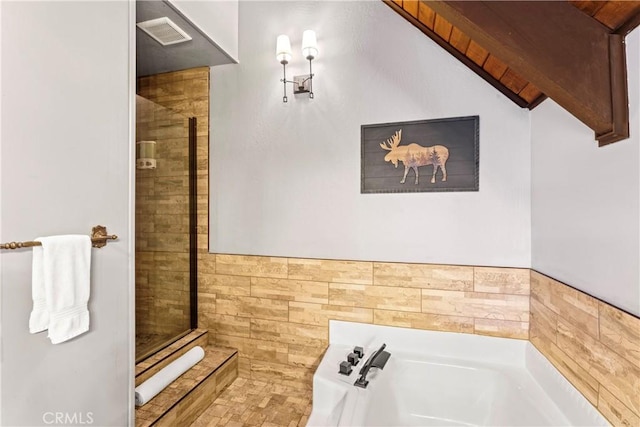 675 Grass Valley Rd, Lake Arrowhead, CA 92352 - bathroom featuring a tile shower, a bath, and visible vents