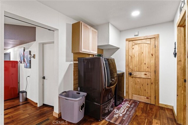 675 Grass Valley Rd, Lake Arrowhead, CA 92352 - laundry area featuring cabinet space, independent washer and dryer, baseboards, and dark wood-style floors