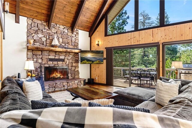 675 Grass Valley Rd, Lake Arrowhead, CA 92352 - living area featuring wooden walls, wood-type flooring, high vaulted ceiling, beamed ceiling, and wood ceiling