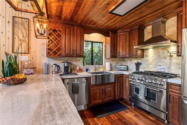 675 Grass Valley Rd, Lake Arrowhead, CA 92352 - kitchen with wall chimney range hood, light countertops, wood ceiling, a sink, and appliances with stainless steel finishes