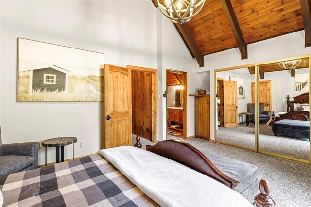 675 Grass Valley Rd, Lake Arrowhead, CA 92352 - bedroom with wood ceiling, beam ceiling, a closet, a chandelier, and carpet flooring
