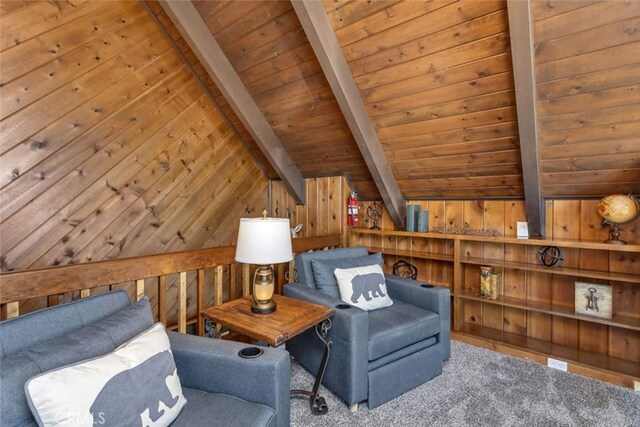 675 Grass Valley Rd, Lake Arrowhead, CA 92352 - sitting room with carpet floors, wood walls, lofted ceiling with beams, and wooden ceiling